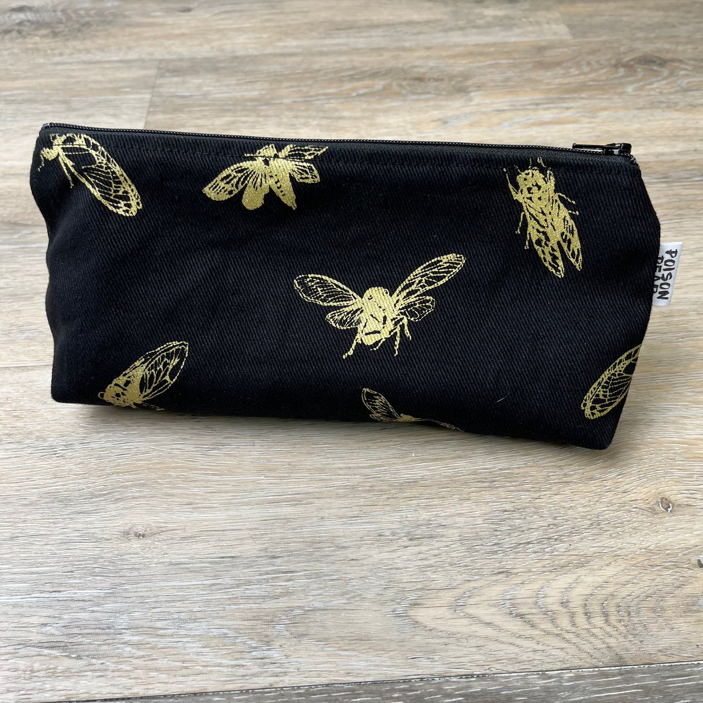 
                  
                    Cicada Pouch poison-pear
                  
                