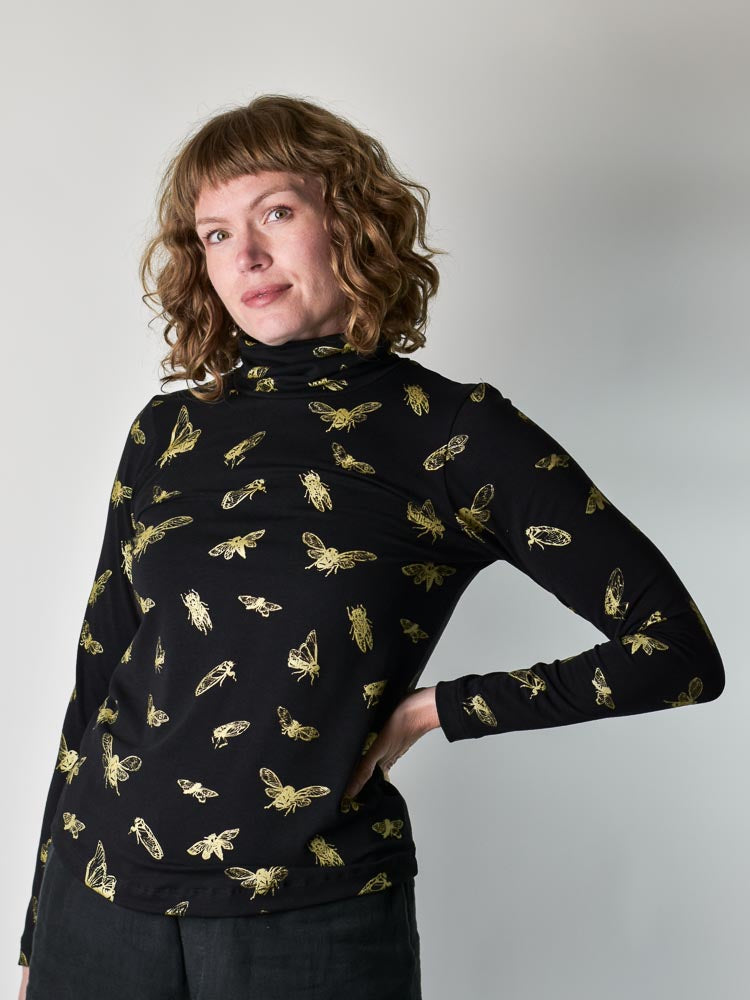 
                  
                    Cicada Turtleneck poison-pear
                  
                
