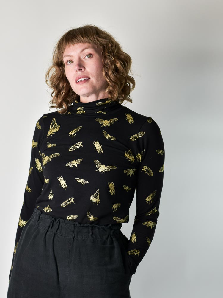 
                  
                    Cicada Turtleneck poison-pear
                  
                