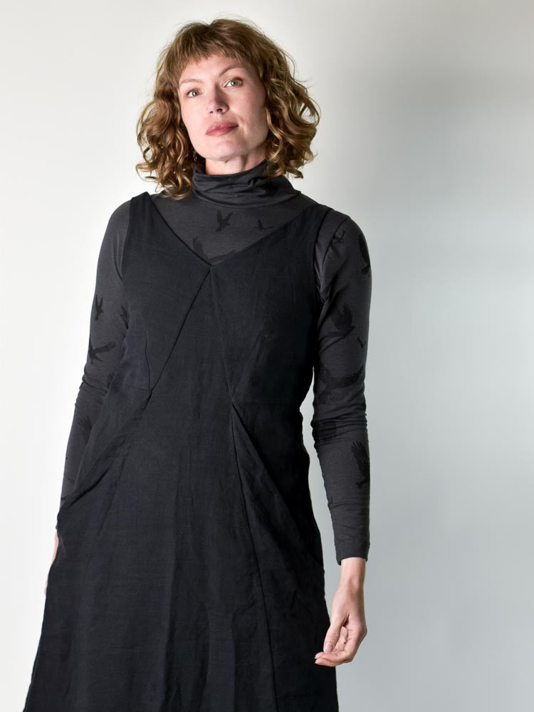
                  
                    Crow Turtleneck poison-pear
                  
                