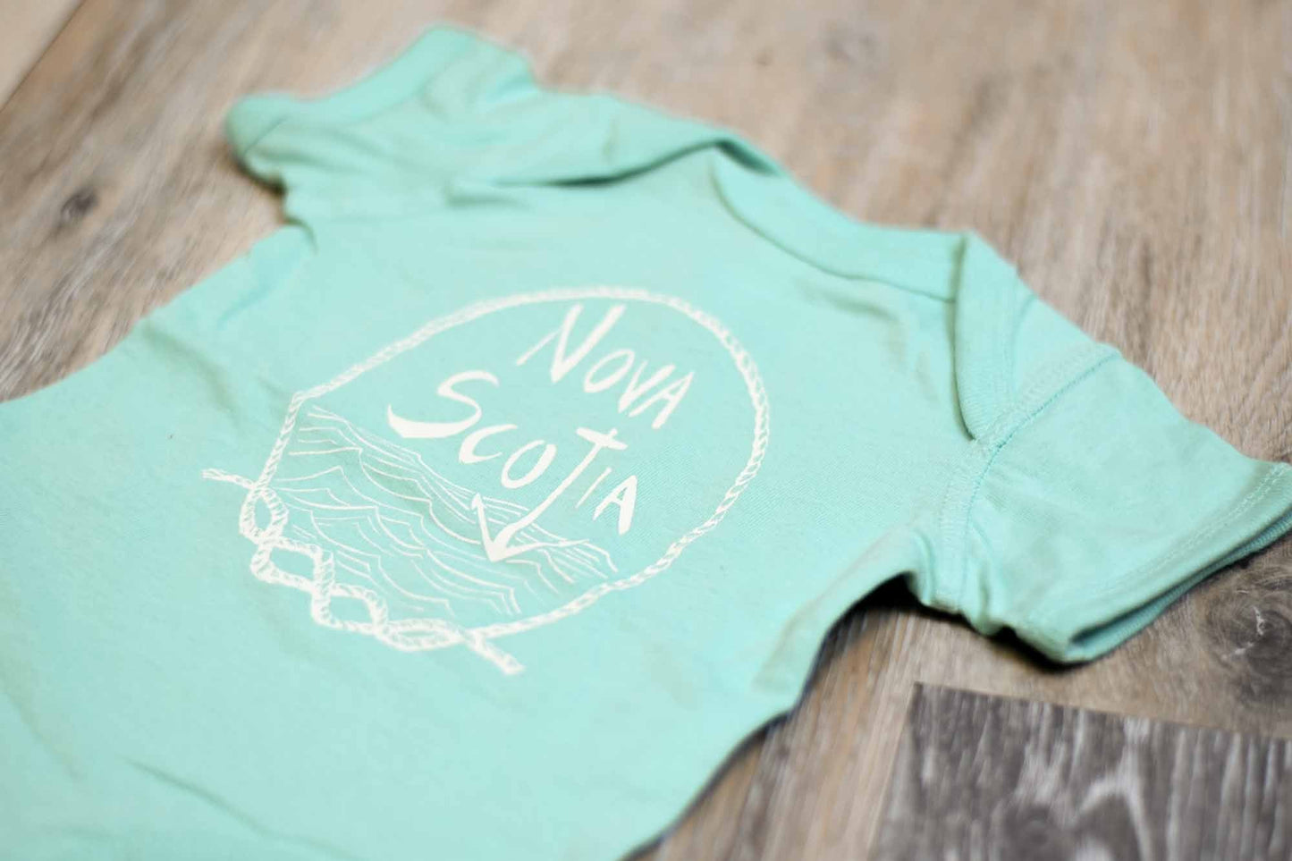 
                  
                    Baby Bodysuit - Nova Scotia Mint poison-pear
                  
                