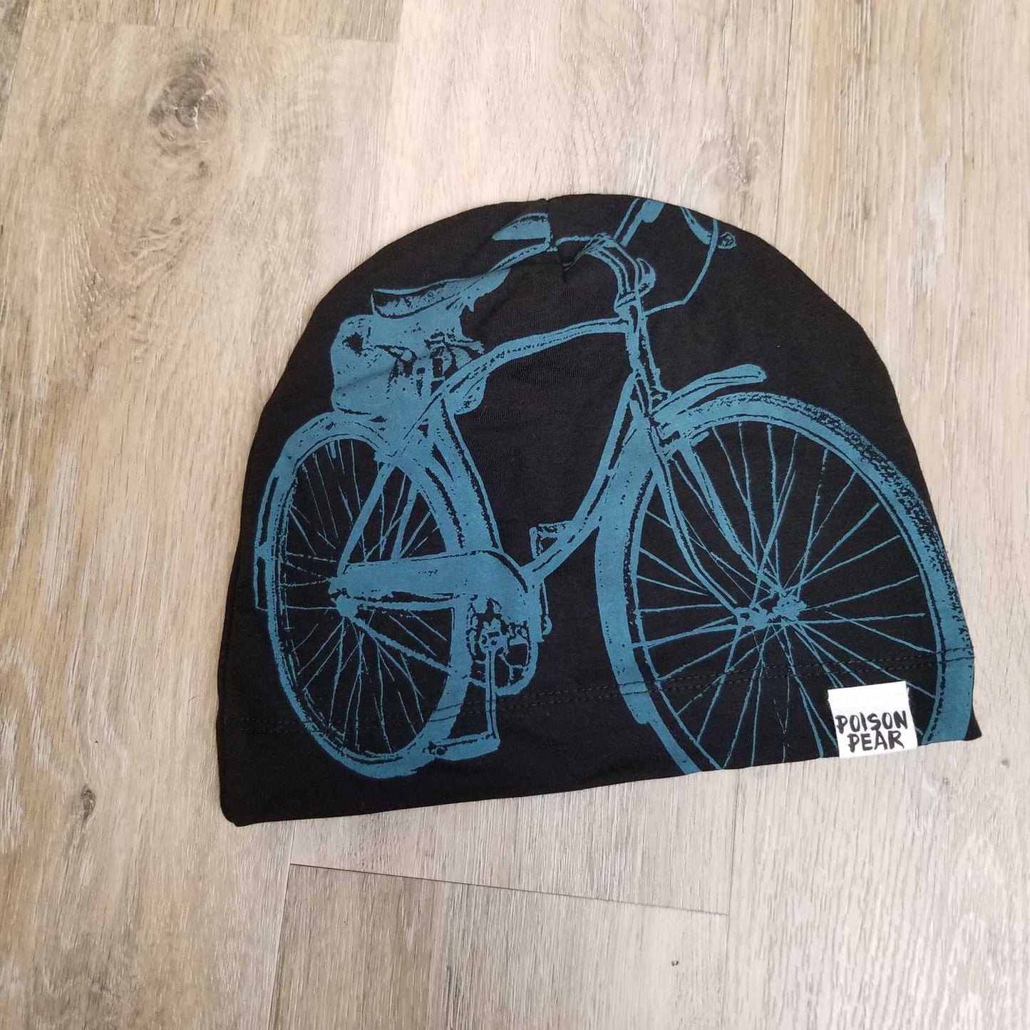 
                  
                    Beanie Hat - Black and Teal Bike poison-pear
                  
                