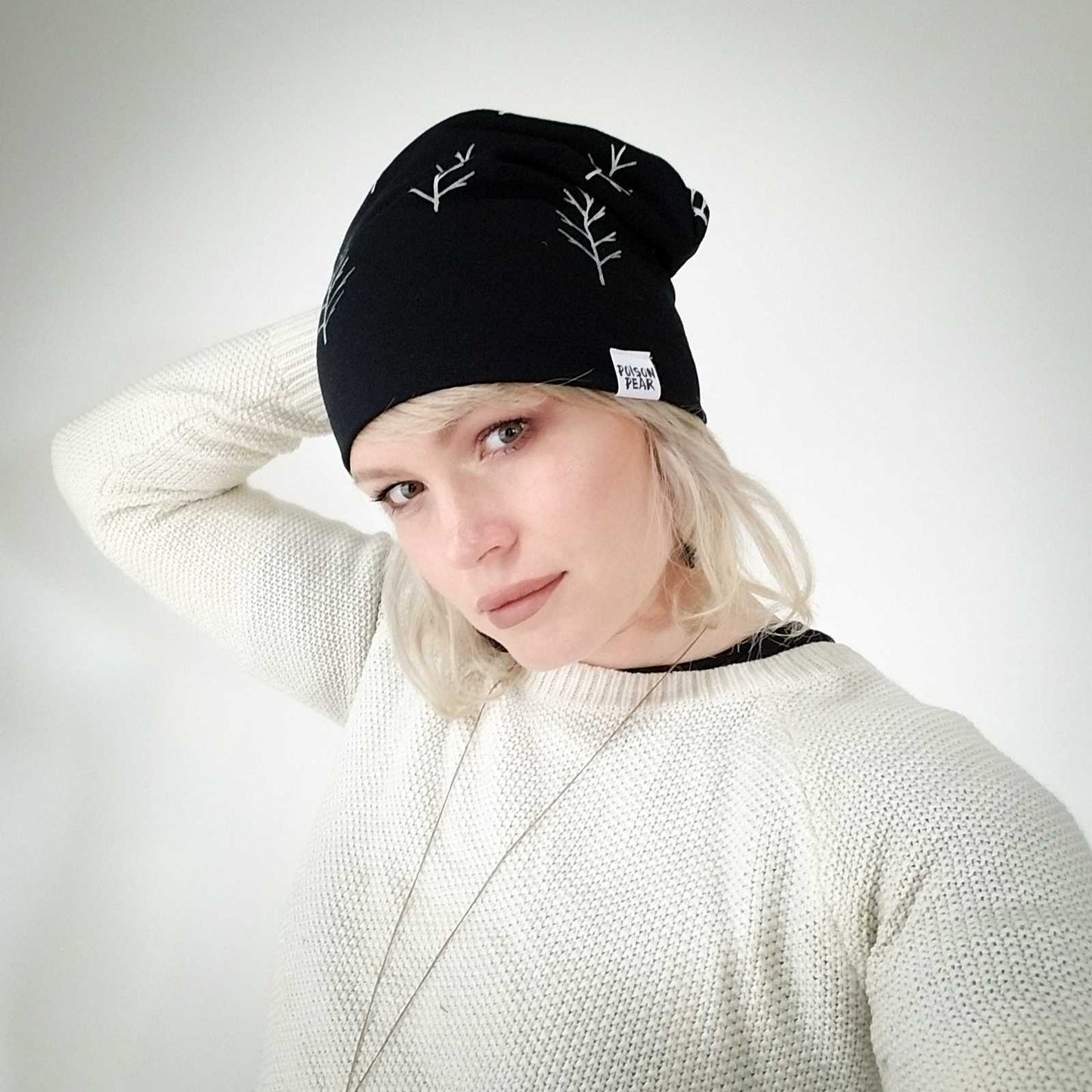 
                  
                    Slouchy Hat - Black Twigs poison-pear
                  
                